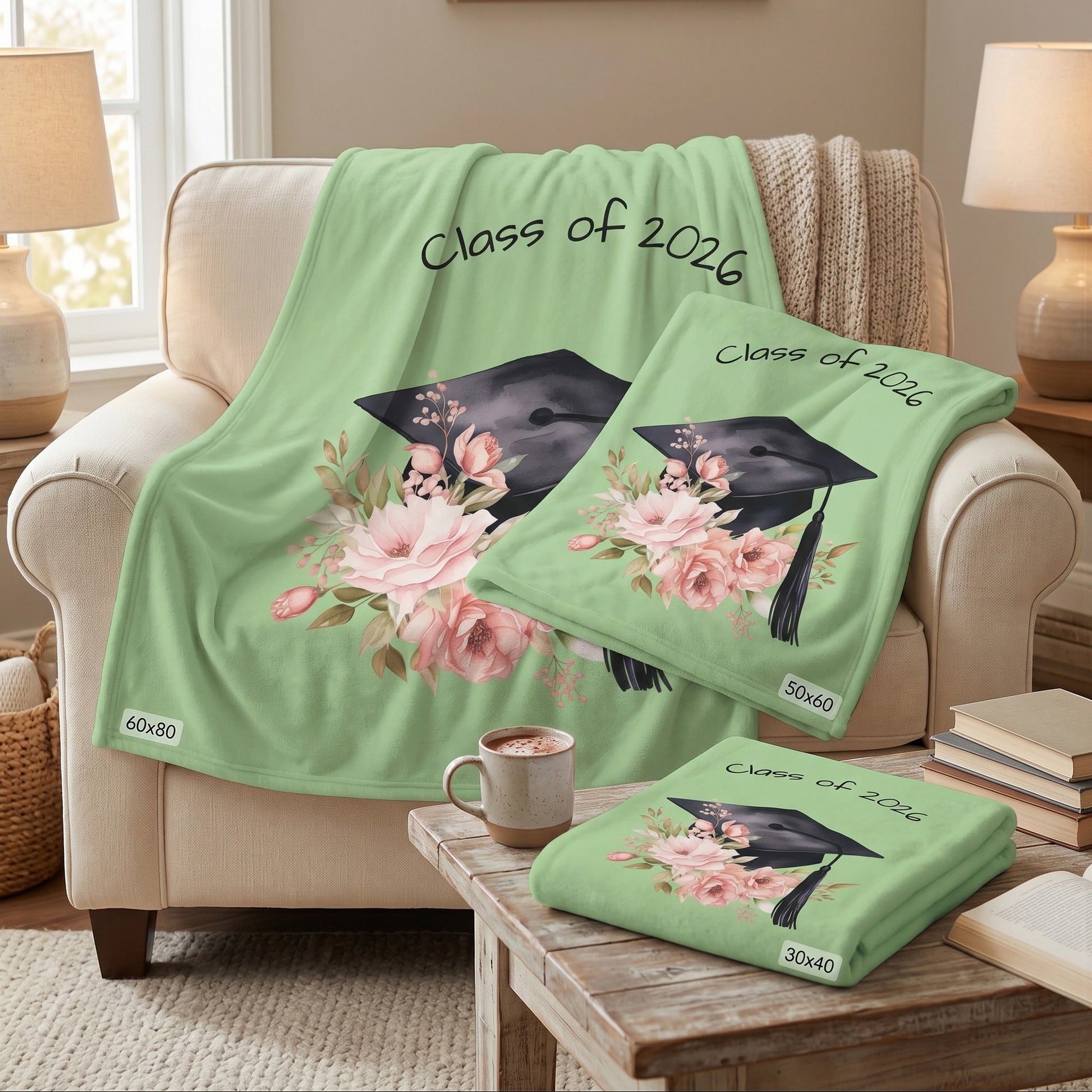 Class of 2026 floral graduation blanket in 3 sizes 30x40 50x60 and 60x80 on cream armchair, graduation gift for her