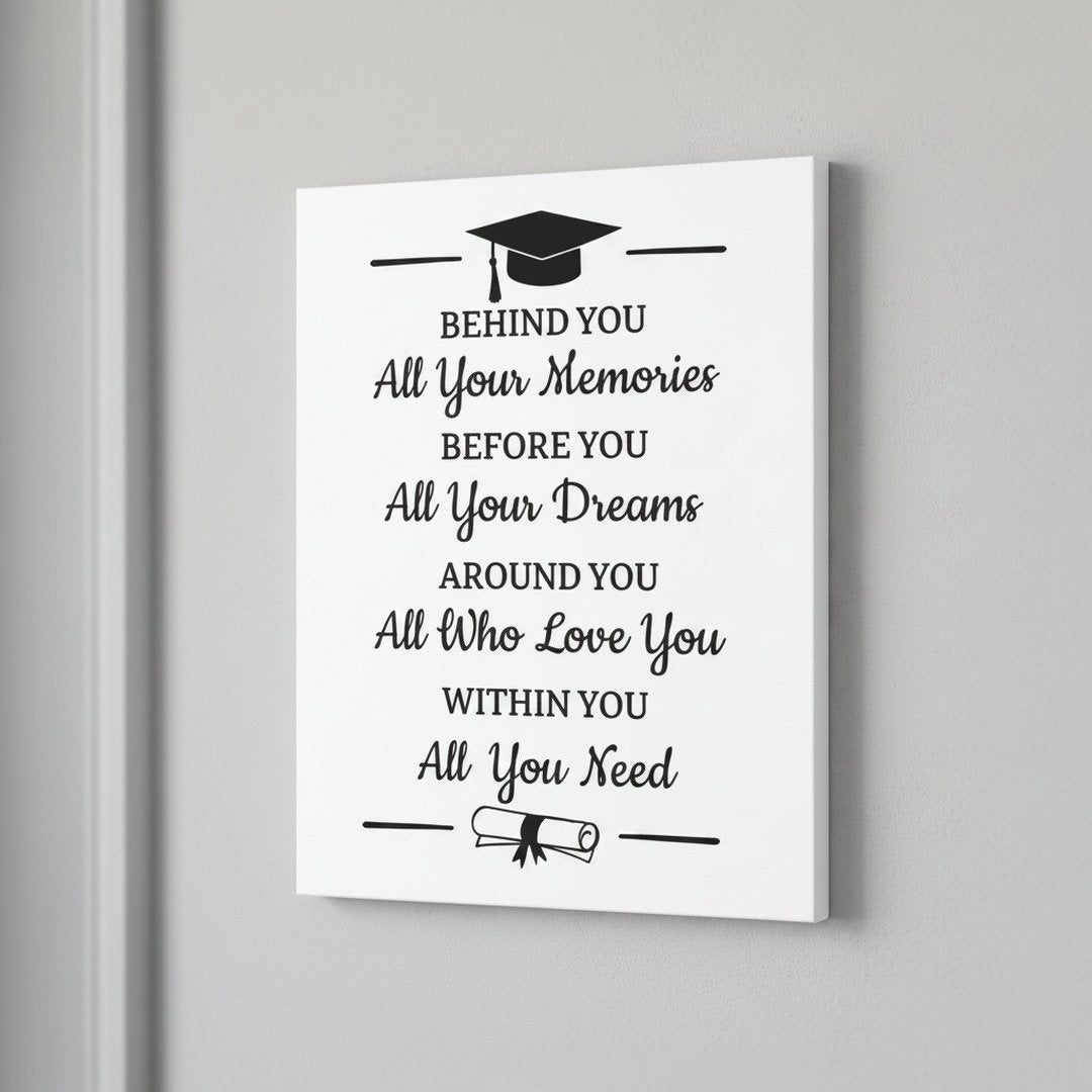 Close-up of graduation quote canvas showing cap graphic, Behind You All Your Memories Before You All Your Dreams inspirational text, meaningful grad gift