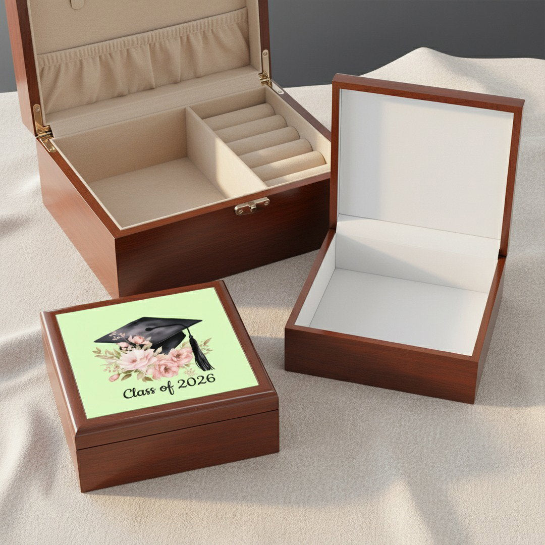 Class of 2026 graduation jewelry box open showing cream velvet interior with ring rolls and compartments