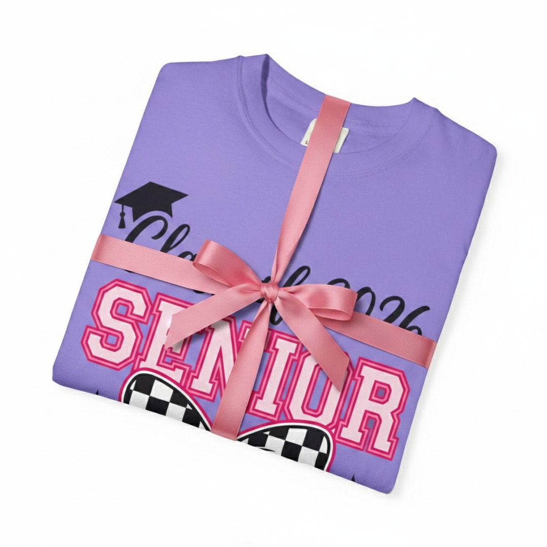 Folded purple Class of 2026 Senior Bow t-shirt tied with a pink satin ribbon, white background, graduation gift idea